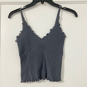 Free people Grey cami, very soft material and stretchy. Size- M/L
